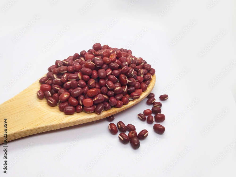 red beans in a wooden spoon red beans in a wooden spoon