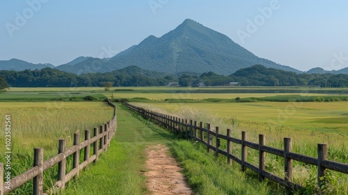 Tranquil hiking path guiding you to stunning panoramic views of magnificent mountain scenery