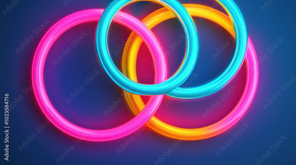 Bright neon interlocking rings create dynamic and vibrant visual effect, showcasing blend of colors including pink, blue, and yellow against deep blue background Bright neon interlocking rings create dynamic and vibrant visual effect, showcasing blend of colors including pink, blue, and yellow against deep blue background
