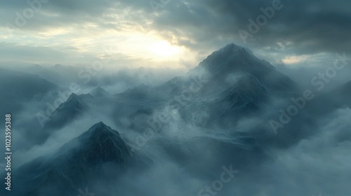 A foggy mountain landscape with rolling hills immersed in thick mist and soft light at dawn