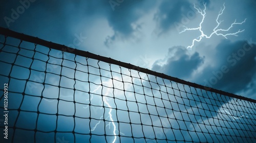 Volleyball Net Battling a Storm, A dramatic image of a volleyball net silhouetted against a stormy sky. Lightning strikes illuminate the net, creating a powerful contrast between light and dark.