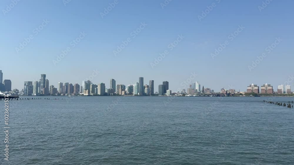 Scenic panoramic Hudson River and Jersey City vista on a gorgeous mid-September day, New York City Scenic panoramic Hudson River and Jersey City vista on a gorgeous mid-September day, New York City