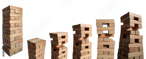 Close-up of a wooden tower made of blocks isolated on a white background. A tower of unevenly shifted wooden beams. 
