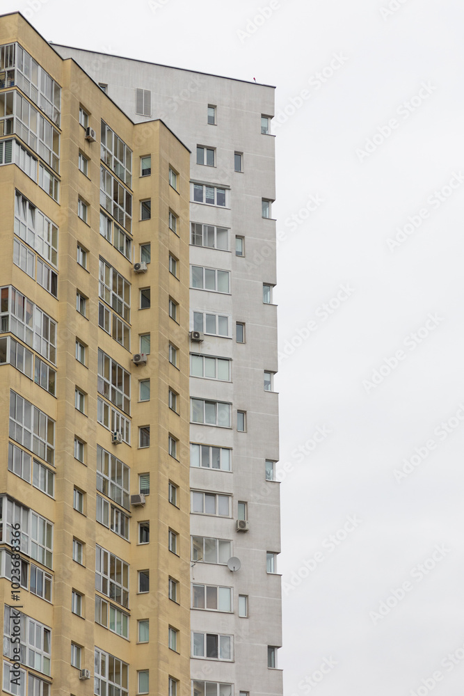 Modern high-rise apartment buildings in a residential area showcasing diverse architectural styles and urban living options Modern high-rise apartment buildings in a residential area showcasing diverse architectural styles and urban living options