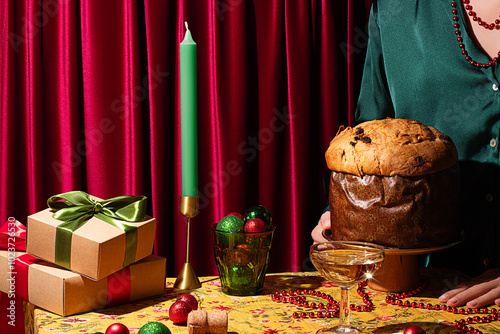 Elegant Christmas table display featuring gifts and panettone photo