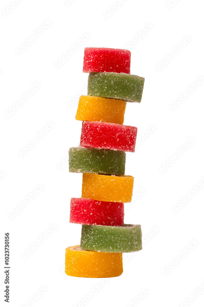 Jelly sweet candy roll isolated on a white background. Marmalade candy. Jelly sweet candy roll isolated on a white background. Marmalade candy.
