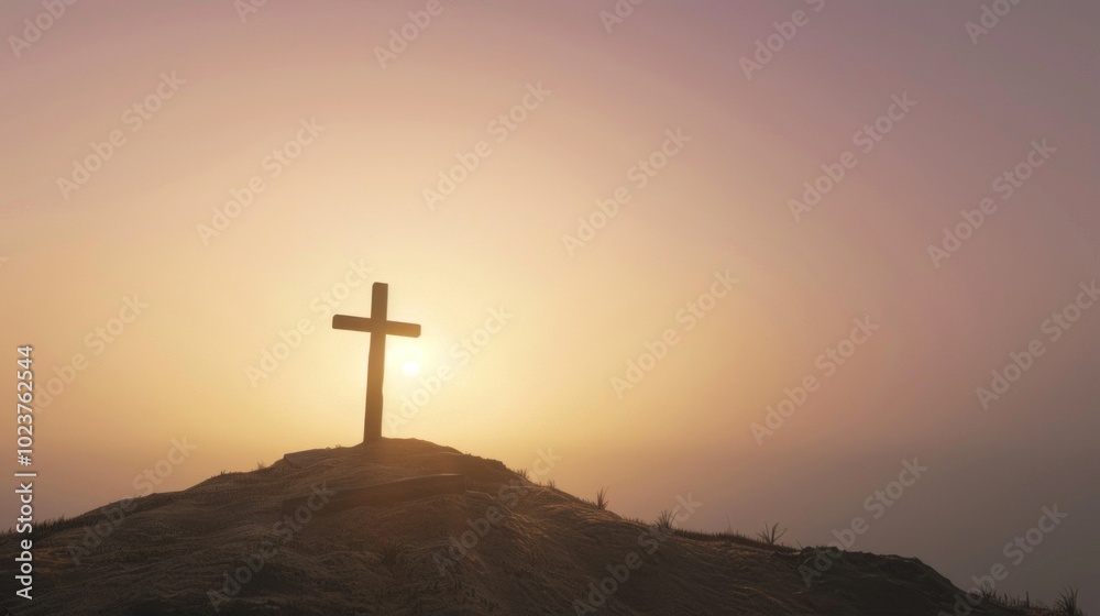 Silhouette of cross on hilltop at sunrise with peaceful sky Silhouette of cross on hilltop at sunrise with peaceful sky