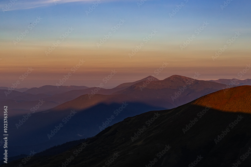 incredibly beautiful gradient of colors in the sky after sunset in the mountains incredibly beautiful gradient of colors in the sky after sunset in the mountains