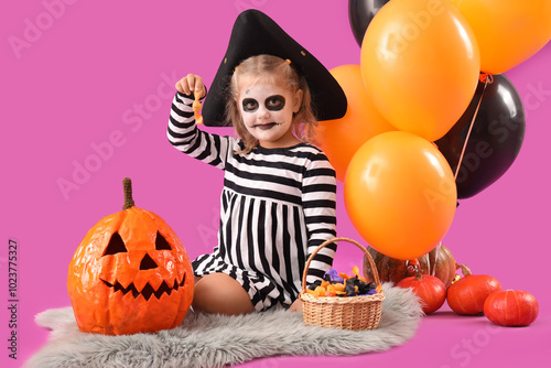 Little girl dressed for Hal...