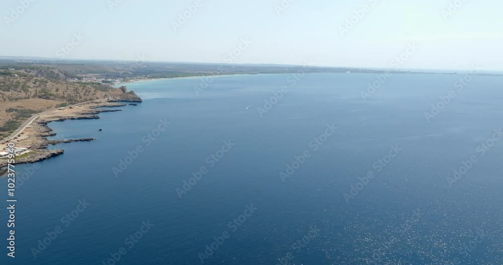 Aerial view of the coast of Salento, Italy, on the Ionian Sea. Aerial view of the coast of Salento, Italy, on the Ionian Sea.