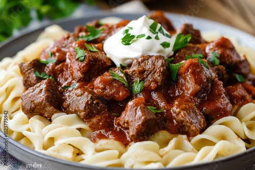 Hearty Beef Goulash with Paprika Sauce and Buttered Noodles for Culinary Delight