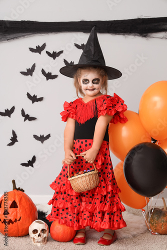 Little girl dressed for Hal...