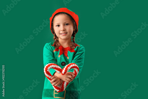 Little girl in an elf costu...