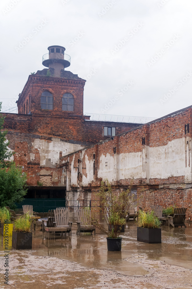 public space on the territory of the former factory in rainy weather public space on the territory of the former factory in rainy weather