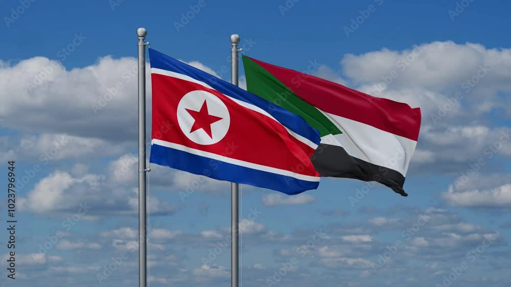 Sudan and North Korea flags flying together, video concept of the relationship, two country cooperation concept Sudan and North Korea flags flying together, video concept of the relationship, two country cooperation concept