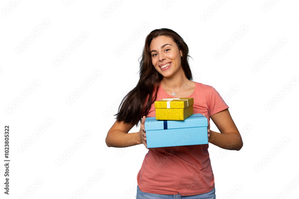 Young woman smiling while presenting a beautifully wrapped gift Young woman smiling while presenting a beautifully wrapped gift