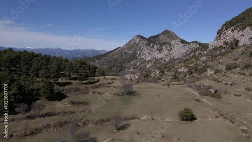 Wallpaper Mural Aerial drone footage over alpine meadows with mountains in the background on a clear fall day in the southern Alps Torontodigital.ca