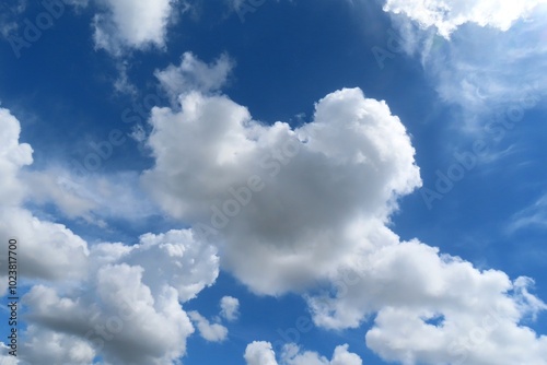 Fototapeta Naklejka Na Ścianę i Meble -  Beautiful heart shape cloud in blue sky, natural cloudscape