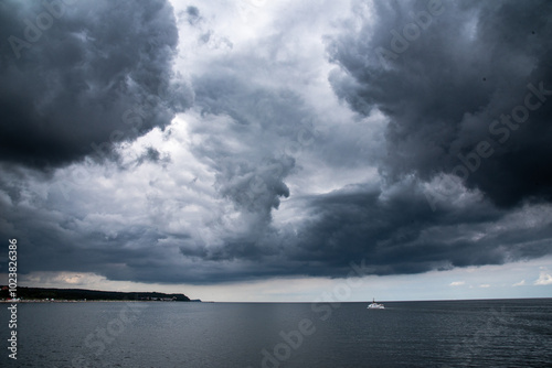 Sailing in Baltic sea in cloudy day photo