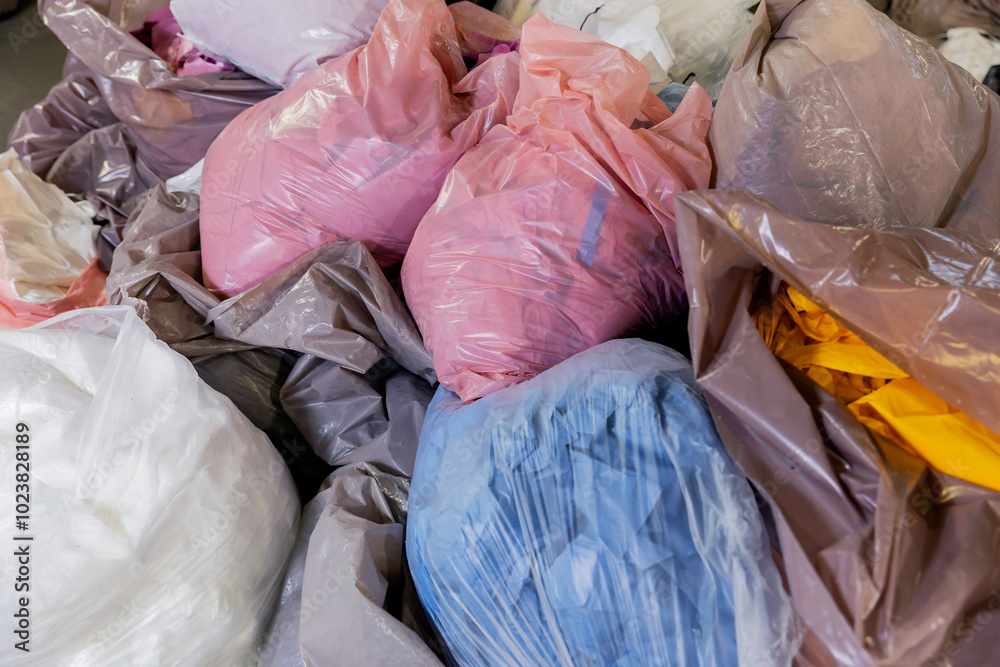 Industry Plant for sorting and processing plastic and paper waste. Conveyor assembly line with garbage bottles and packaging