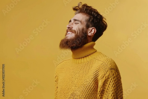 Handsome man in turtleneck sweater smiling confidently.