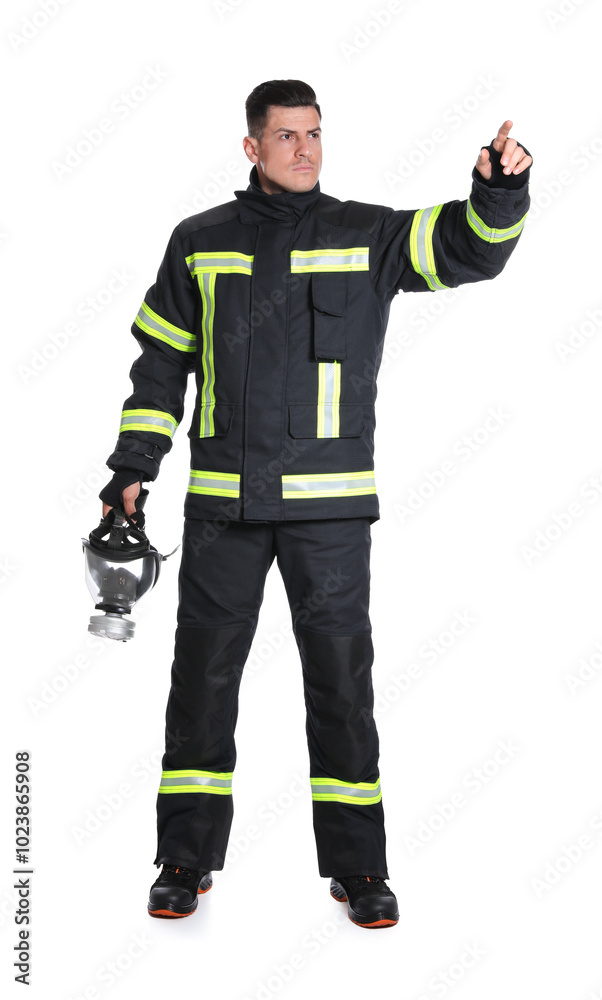 Full length portrait of firefighter in uniform with gas mask on white background Full length portrait of firefighter in uniform with gas mask on white background