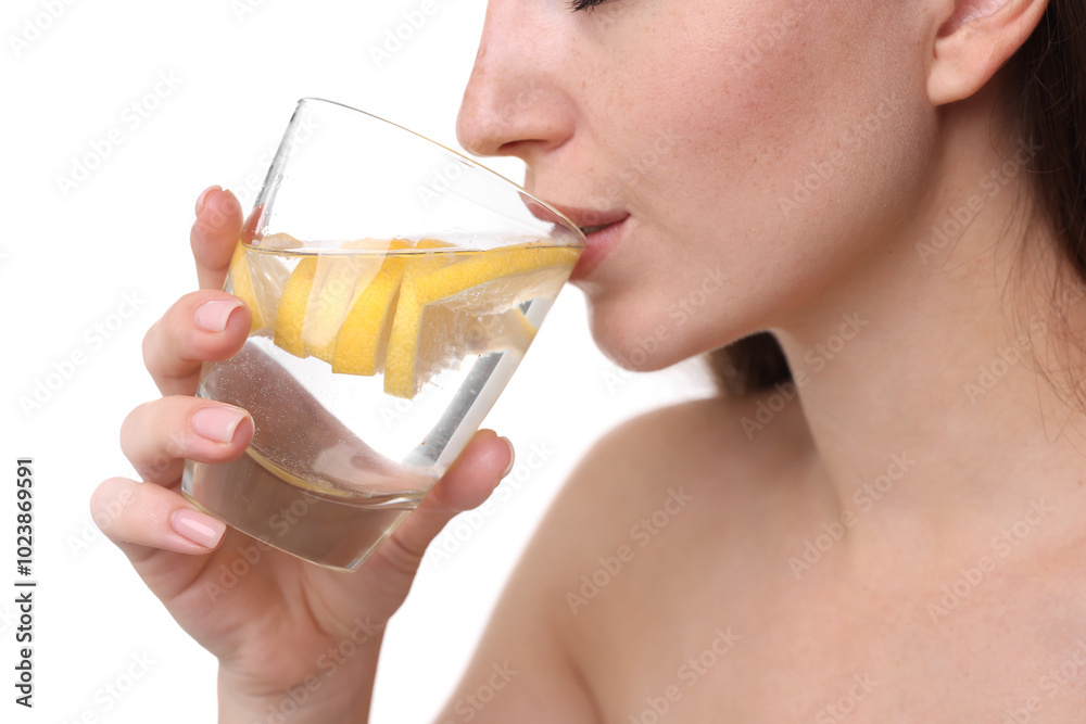 Woman drinking water with lemon on white background, closeup Woman drinking water with lemon on white background, closeup