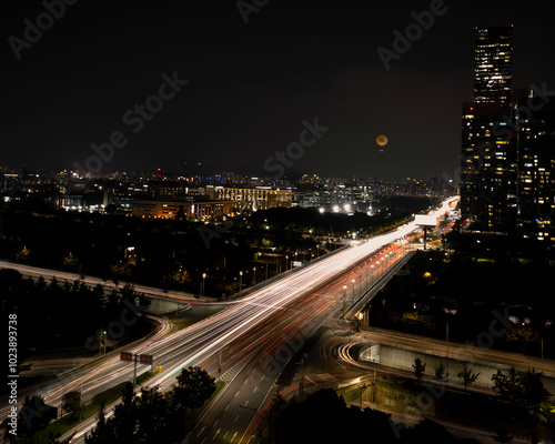 City view of long exposure traffic at night, capturing the vibrant energy and motion of the scene, Seoul, Korea