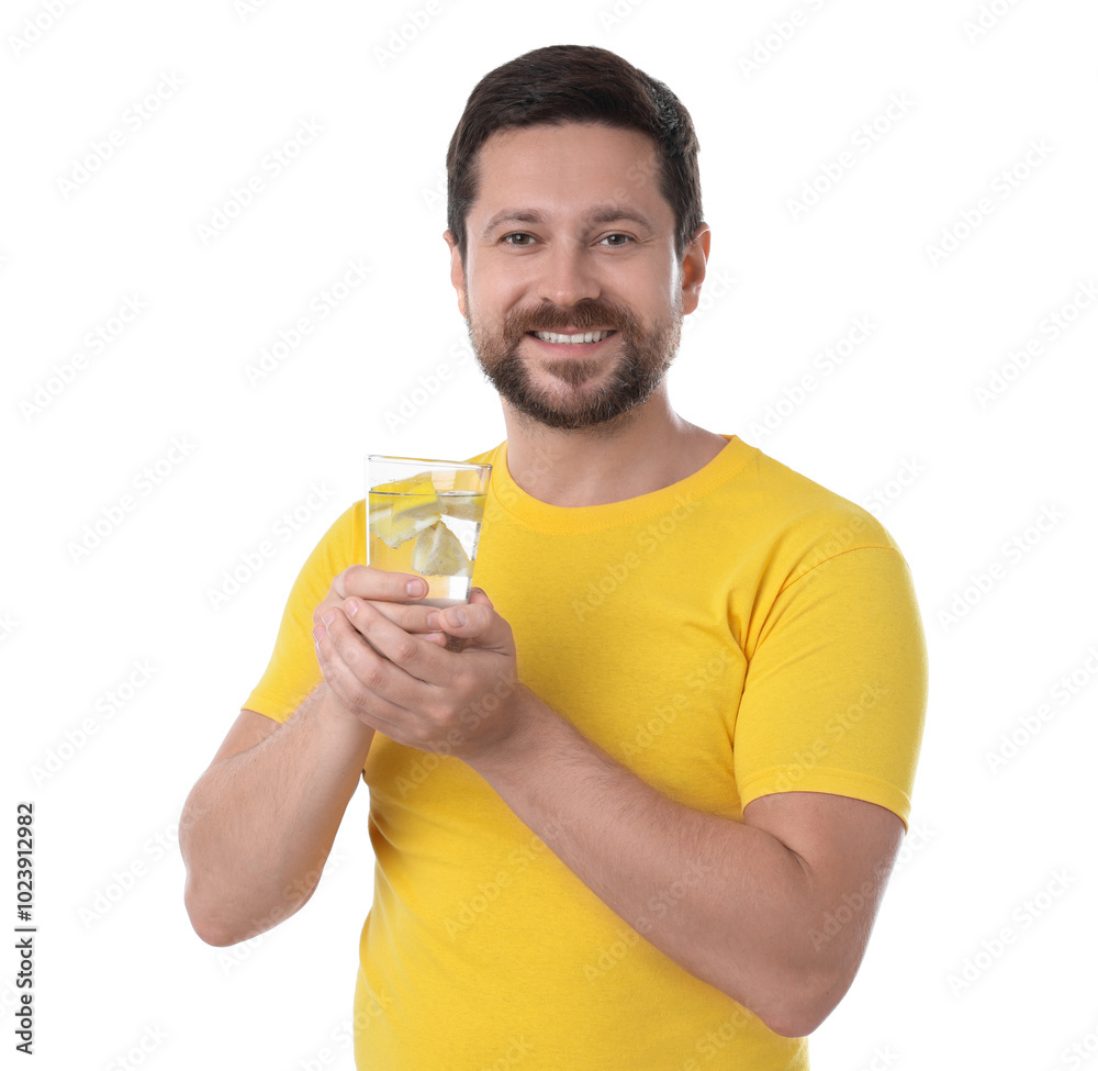 Happy man holding glass of water with lemon on white background Happy man holding glass of water with lemon on white background