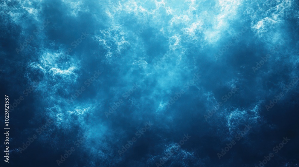 A deep blue sky with white clouds, lit by a bright sun, creating a dramatic and atmospheric backdrop. A deep blue sky with white clouds, lit by a bright sun, creating a dramatic and atmospheric backdrop.