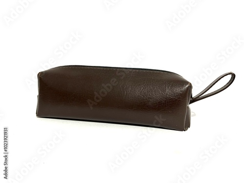 Dark brown pencil case made from leather with the zipper opened isolated on white background