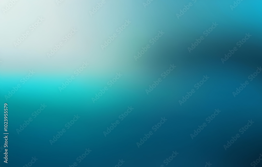 Obraz premium A blurred gradient background with a blend of light blue and teal.