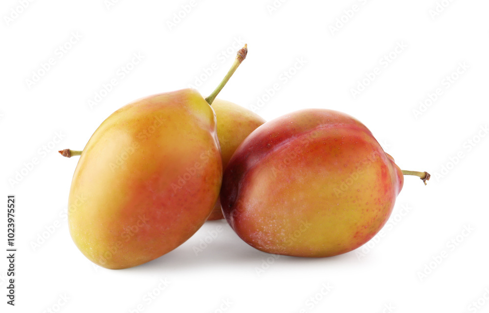 Group of fresh ripe plums isolated on white Group of fresh ripe plums isolated on white