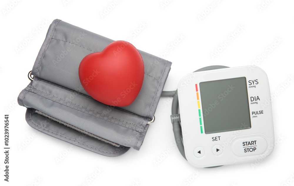 Blood pressure monitor and red decorative heart isolated on white, top view Blood pressure monitor and red decorative heart isolated on white, top view