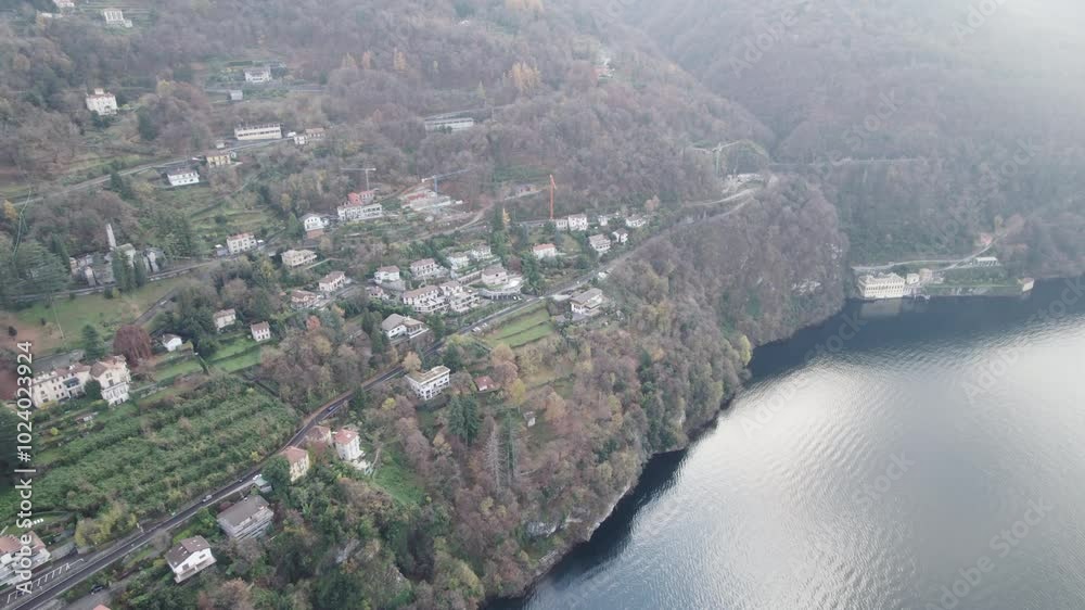 Aerial video over the famous Lake Como in Italy in a snowy winter. Aerial video over the famous Lake Como in Italy in a snowy winter.