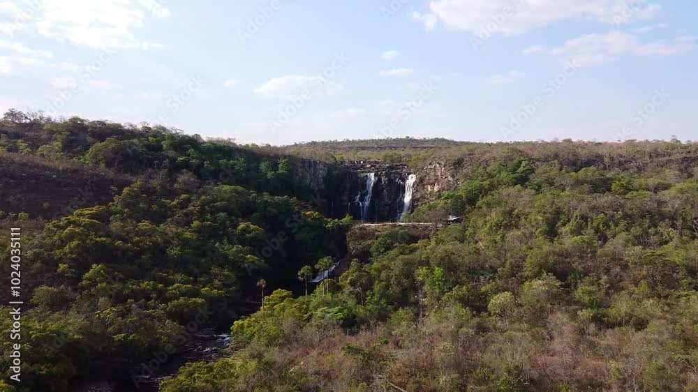Salto Corumbá waterfall with crystal clear waters in the middle of the forest in the Brazilian cerrado, Brazil Salto Corumbá waterfall with crystal clear waters in the middle of the forest in the Brazilian cerrado, Brazil
