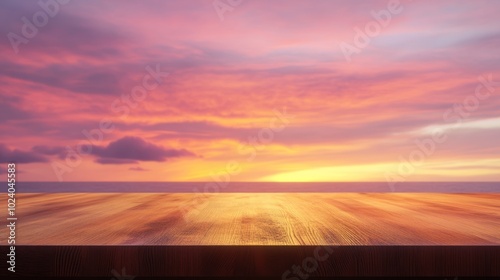 Wooden table with sunset background