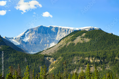 Mount Cromwell covered with snow in summer, seen from the Icefields Parkway between Banff and Jasper in Alberta, Canada