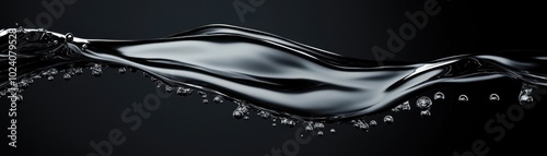 A Single Silver Wave of Liquid Against a Black Background