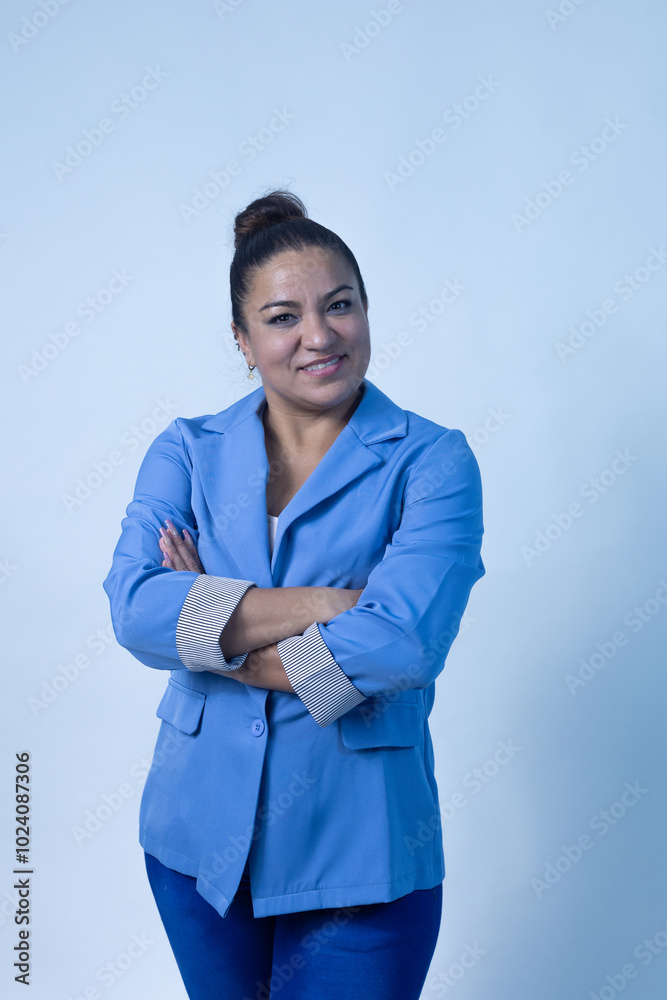 A portrait of a confident woman wearing a stylish blue blazer, exuding poise and assurance A portrait of a confident woman wearing a stylish blue blazer, exuding poise and assurance