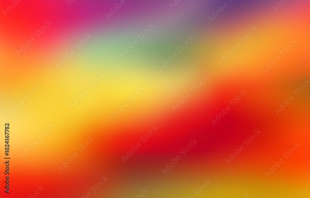 Naklejka premium A blurry background with vibrant colors, including red, orange, yellow, green, and purple.