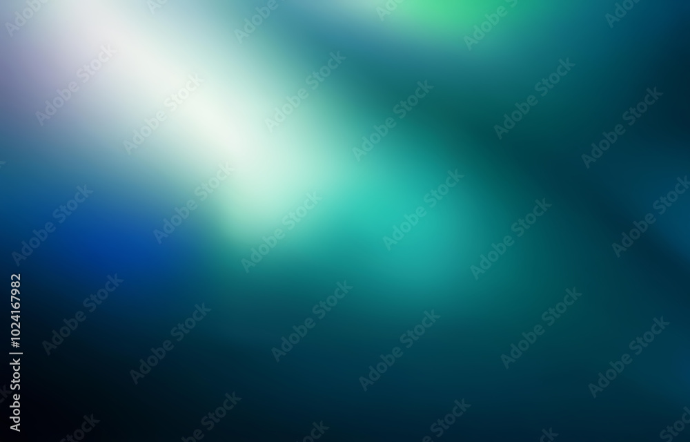Obraz premium A blurred background with shades of blue and green.