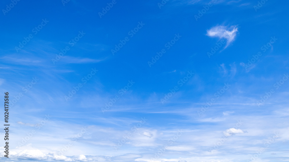 clear blue sky background,clouds with background, Blue sky background with tiny clouds. White fluffy clouds in the blue sky. clear blue sky background,clouds with background, Blue sky background with tiny clouds. White fluffy clouds in the blue sky.