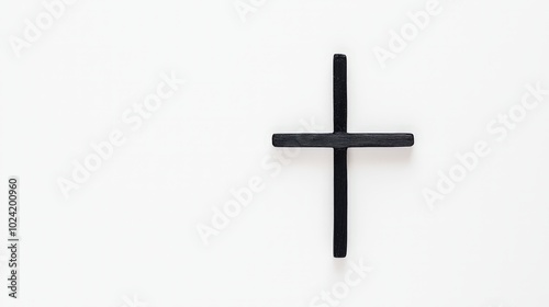 Minimalist cross made of two thin lines on a blank canvas