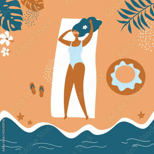 Beautiful tanned girl in swimsuit sunbathing on the beach on sea or ocean. Woman lying on towel on sandy shore after surfing. Top view. summer time, relax, rest and vacation.