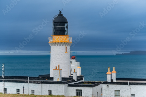 Dunnet Head, a rounded, cliffed sandstone headland in the Highland council area, Scotland, that is the northernmost point on the mainland of Great Britain photo