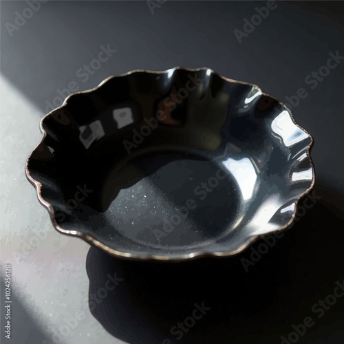 Black Ruffled Bowl on Dark Background 
