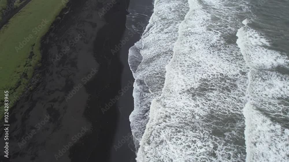 Black sand beach in Iceland. Filmed from above with a Drone. Different shots available in my portfolio. Black sand beach in Iceland. Filmed from above with a Drone. Different shots available in my portfolio.