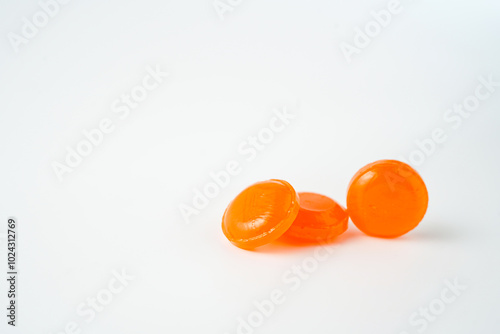 Medical lozenges for relief cough, sore throat and throat irritation isolated on white background