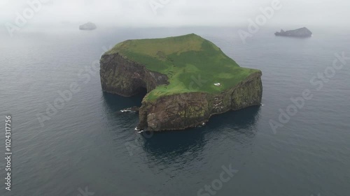 Aerial Footage of an isolated and deserted island in Iceland with a house/cottage. Filmed with a Drone. Different shots available in my portfolio.